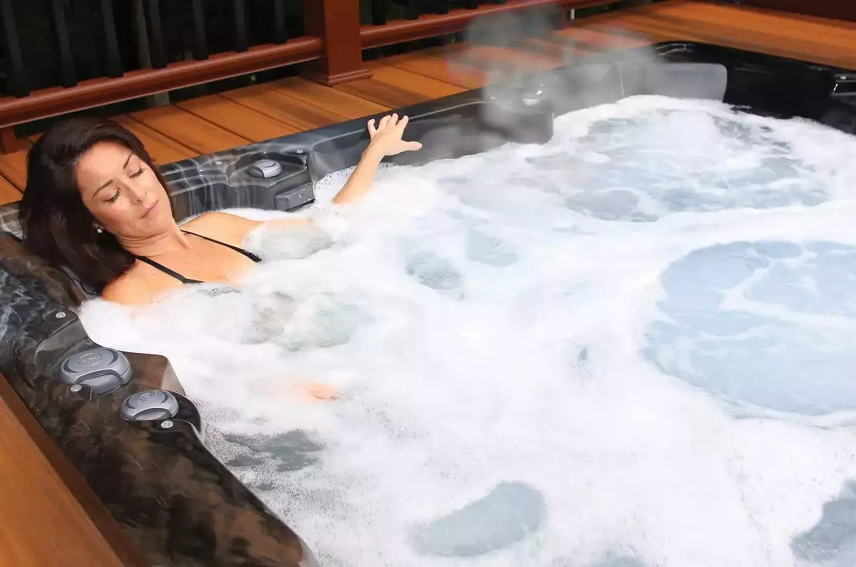 woman soaking in spa pdc hot tub